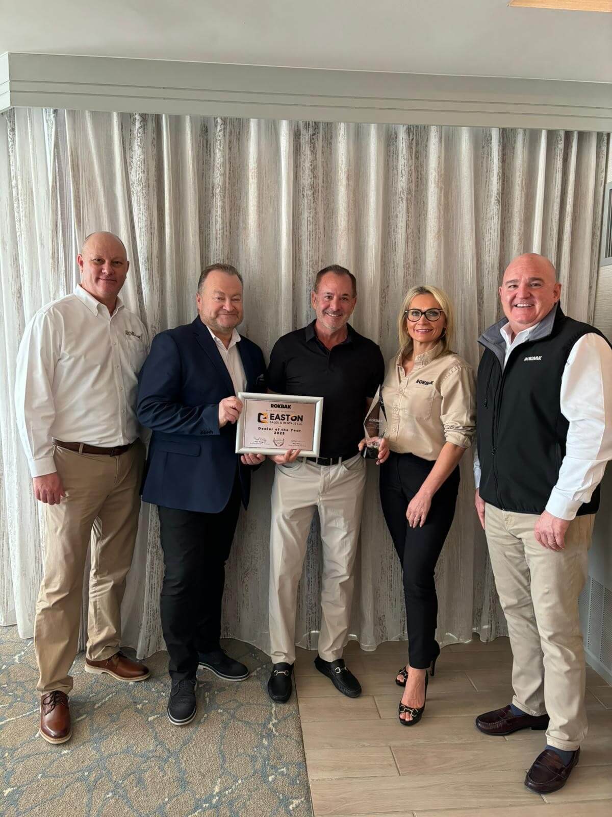Easton staff receiving certificate